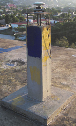 Monumentation of BASE 2 site, located on top of a facility building; UAS campus. GPS Receiver Leica SR500 with Leica (LEIAT502) antenna, collecting data on October 10, 2010.