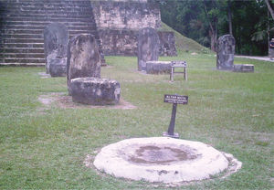 Modern altar among ancient stelae, Tikal