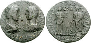 Medalla consular acuñada en 245 d. de C. por Filipo I (244-249 d. de C.). Anverso: Filipo I con Filipo II. Reverso: Higiea de pie alimentando a la serpiente, Asclepio apoyado en el bastón con la serpiente enroscada y Telesforo encapuchado en medio.