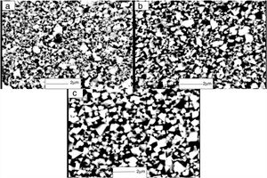 SEM backscattered electron micrographs of WC/40vol%(FeAl-B) with various contents of boron in the aluminide binder (a) 0, (b) 500 and (c) 1000ppm B.