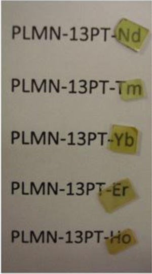 Photography of the obtained transparent PLMN-13PT:RE ceramics, with a thickness of samples 0.5mm.