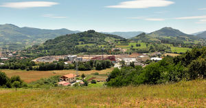 Orona compound setting, a mix of nature and urban development typical of northern Spain.