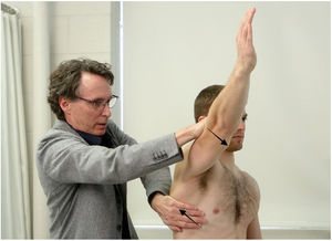 Muscle test for the serratus anterior (shoulder abduction test). The examiner simultaneously resists maximal-effort scapular plane abduction and upward rotation of the scapula.