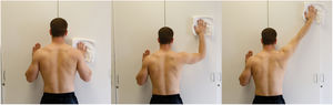 Towel-wall slide. The standing subject slides the towel against a wall, starting in a neutral shoulder position, and ending in combined position of maximal scapular plane abduction and scapular protraction.