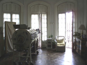 Room in the Ferrer Home in Buenos Aires. The iron lung can be seen in the foreground.