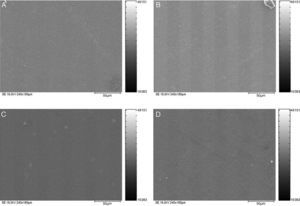 Scanning electronic photomicrographs of Filtek Z350XT samples showing lower surface roughness for Sof-Lex Pop-On+silicon carbide brush (A), Sof-Lex Pop-On+felt discs with diamond paste (B), and Praxis TDV+silicon carbide brush (C) groups in comparison with Praxis TDV+felt discs with diamond paste (D).