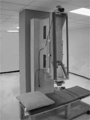 Room-temperature susceptometer. Patients lay on their side below the field-producing coils as the susceptometer recorded changes in the magnetic field induced by hepatic iron.