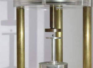 This photograph shows a metal sphere of 3.2mm in diameter levitated at around 3mm above the radiating disk