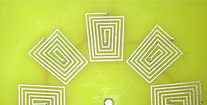 Winding of the proposed microgenerator on board. Winding of the proposed microgenerator on board.