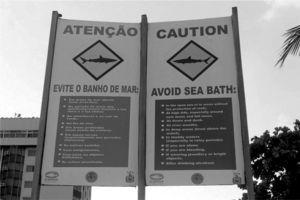 Warning signs are dispersed in all waterfront areas of Recife beaches, Northeastern Brazil.