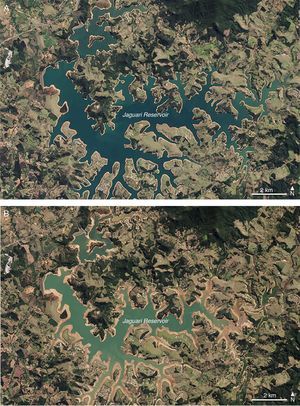 View of the Jaguari reservoir, which is part of the Cantareira system in August, 2013 (A) and August, 2014 (B). The level of lake is lower during the drought of 2014 as shown by the smaller area and by the lighter blue-green color of water. Notice the reduced forest cover in the area, including the margins of the reservoir. Images from NASA Earth Observatory.