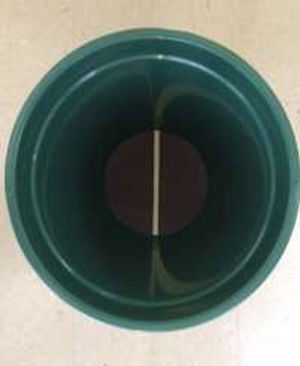 View of the fluorescent tape on the bottom of the inside of the bucket.