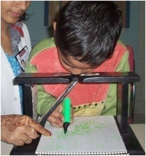 Showing a child using the Cheiroscope.