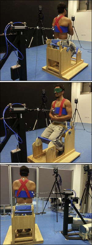 En estas imágenes se presenta un mecanismo de tracción neumática para la aplicación de fuerzas súbitas en diferentes direcciones y sentidos. Para ello, el participante se sitúa en posición semisentada en una silla de madera que permite la colocación del raquis en posición neutra. Una célula de carga colocada entre el pistón neumático y el arnés permite conocer el momento del inicio y la magnitud de la alteración. La respuesta cinemática del tronco ante las fuerzas súbitas se mide gracias a un sistema de análisis de movimiento en 3D.