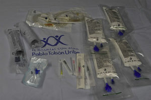 Local anesthetic toxicity kit used at the Pablo Tobón Uribe Hospital. Contents detail: (a) 20% lipid emulsion (four 250mL bags); (b) 3-way lock; (c) 50mL luer-lock syringes for rapid infusion of the lipid emulsion; (d) infusion venoclysis equipment; (e) venous access devices of different diameters.