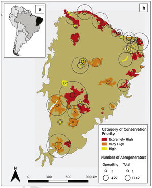 Map South America (a) highlighting the Caatinga ecosystem (b) showing the conservation priority areas (CPA) with no legal protection grouped by the prioritization rank (yellow, orange and red colored areas). Size of continuous circles represent the amount of operating aerogenerators while dashed circles sums projected aerogenerators.